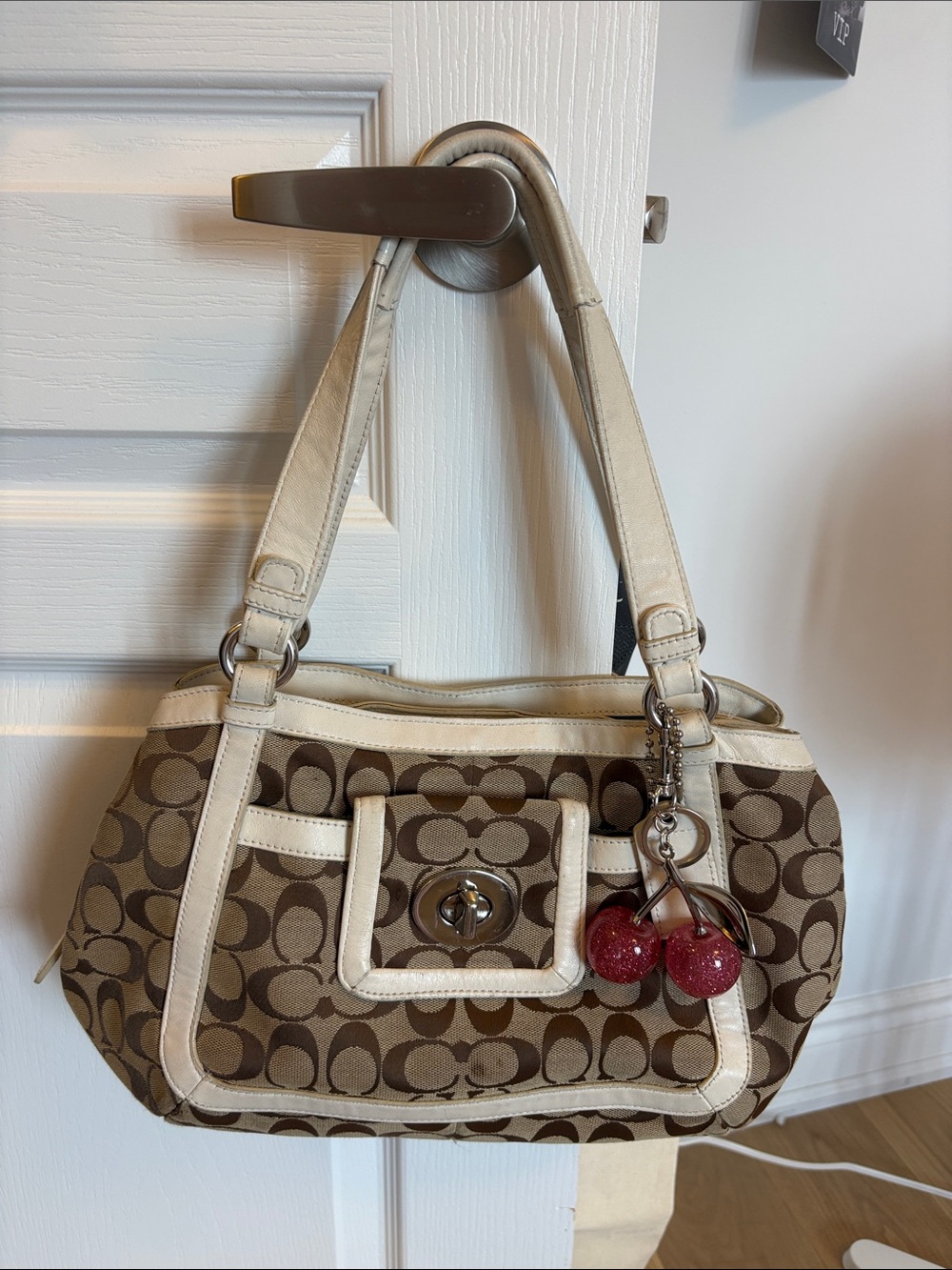 Coach Brown Signature Canvas Shoulder Bag with Cream Trim and Red Charm
